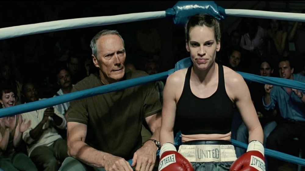 Id-Direttur Clint Eastwood jieħu f’idejh l-irwol ta’ Frankie Dunn, li jibda jħarreġ lil Maggie Fitzgerald (Hilary Swank) fl-isport tal-boxing