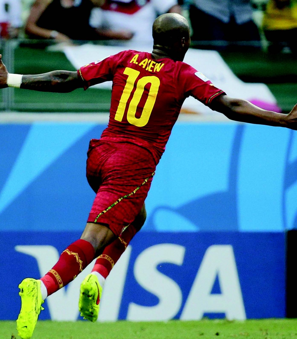 Andre Ayew tal-Ghana jiċċelebra wara l-iskorja l-gowl li ġabhom 1-1 kontra l-Ġermanja f’Estadio Castelao f’Fortaleza, Brażil. Ritratt minn EPA/SERGEY DOLZHENKO