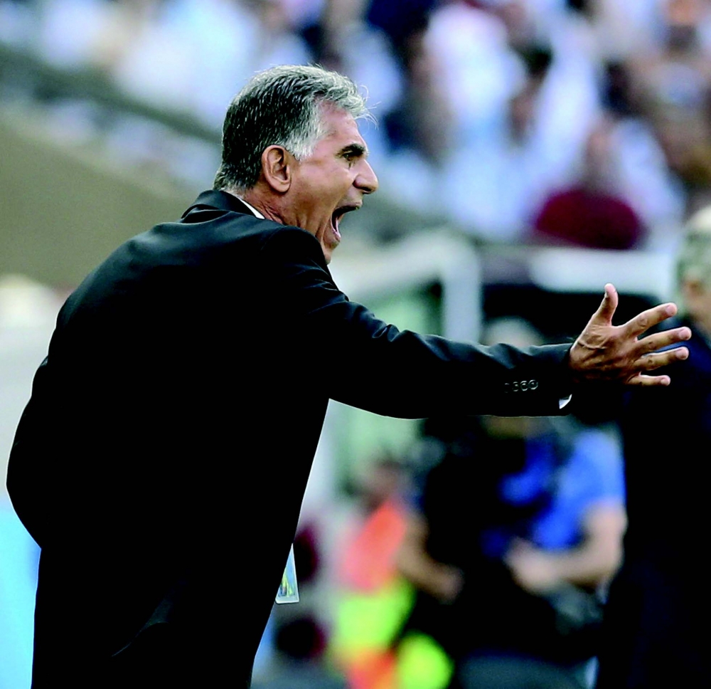 Il-kowċ tal-Iran Carlos Queiroz jirreaġixxi r-rawnd preliminari bejn l-Arġentina u l-Iran fl-Estadio Mineirao f’Belo Horizonte. Ritratt minn EPA/BALLESTEROS