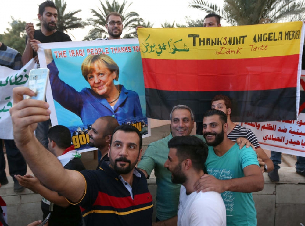 Angela Merkel: Popolari mal-immigranti u għaqdiet favur id-drittijiet tal-bniedem