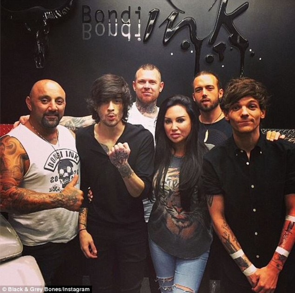 Zayn Malik u Louis Tomlinson mal-artisti tat-tpinġija
